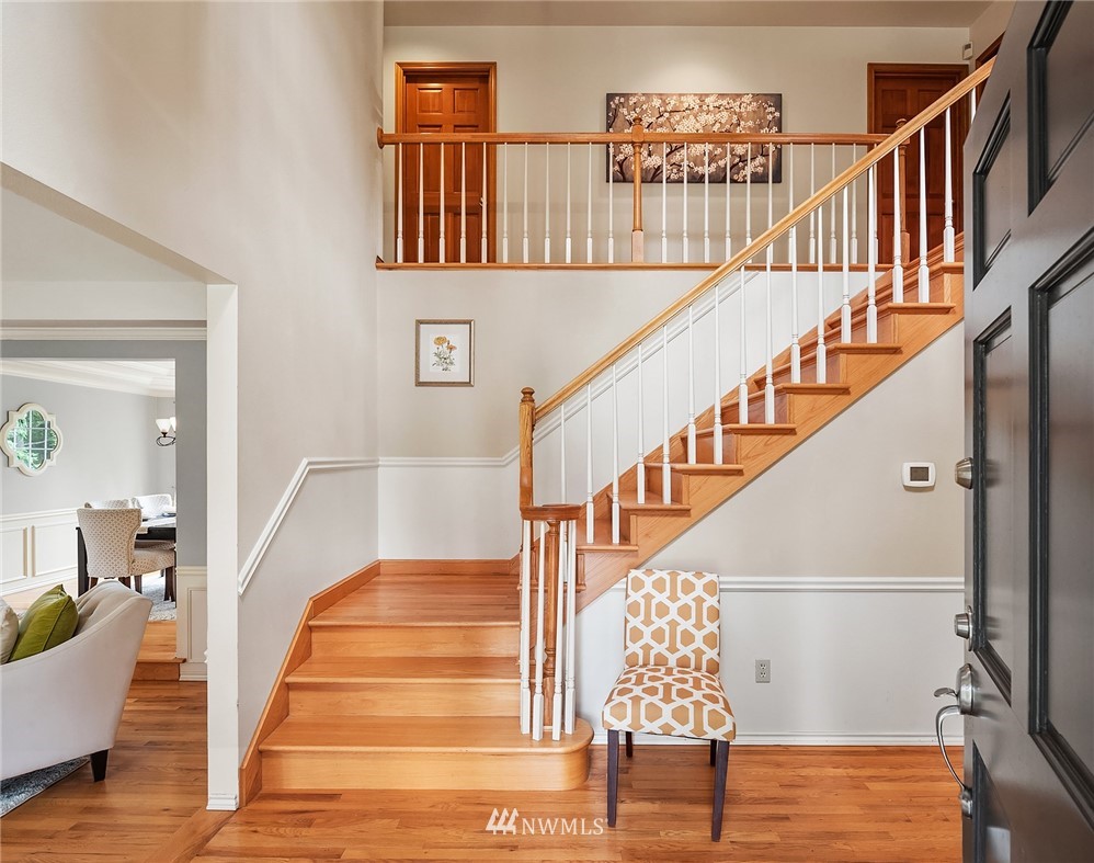 21127 47th Drive Southeast Bothell, WA 98021 - Photo 3 of 38 a view of entryway and hall with wooden floor