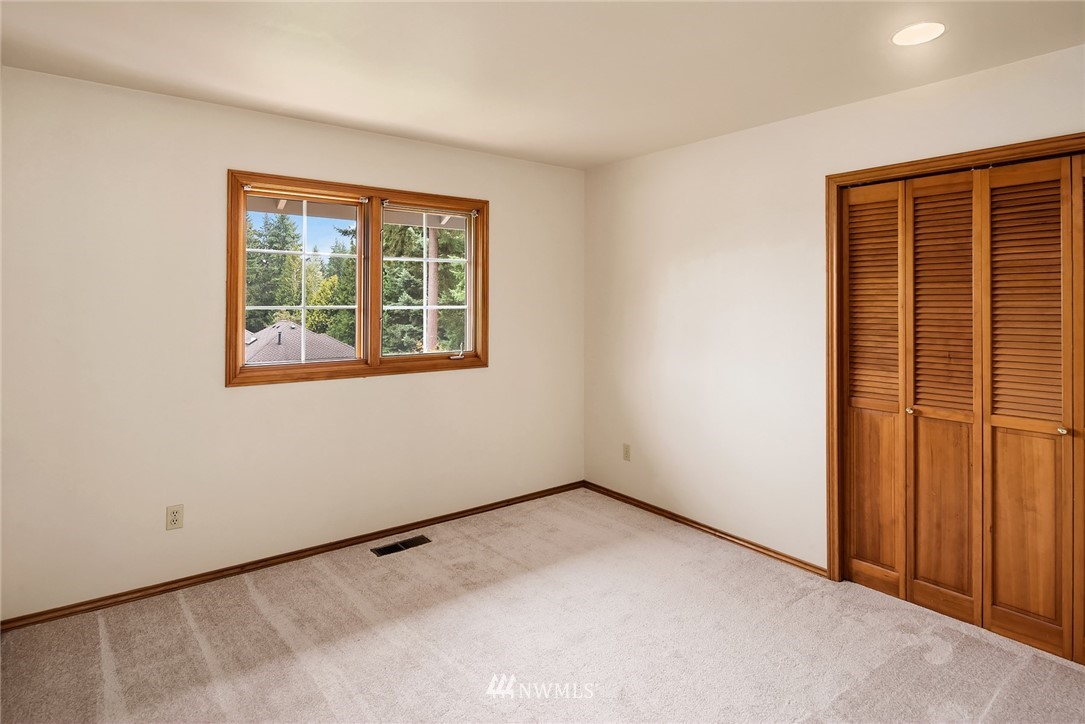 21127 47th Drive Southeast Bothell, WA 98021 - Photo 22 of 38 an empty room with a window