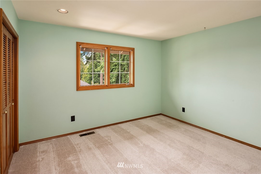 21127 47th Drive Southeast Bothell, WA 98021 - Photo 25 of 38 a view of an empty room with a window