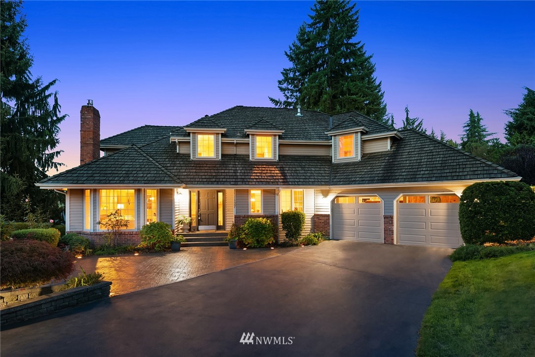 21127 47th Drive Southeast Bothell, WA 98021 - Photo 28 of 38 a front view of a house with a yard