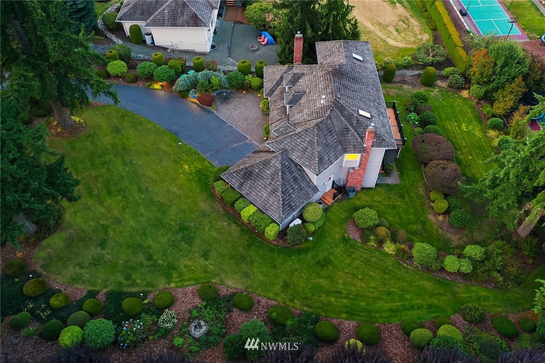 21127 47th Drive Southeast Bothell, WA 98021 - Photo 34 of 38 a aerial view of a house with a garden and plants