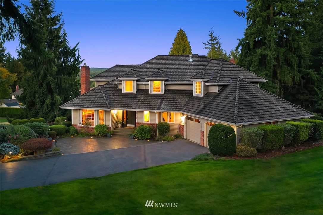 21127 47th Drive Southeast Bothell, WA 98021 - Photo 35 of 38 a front view of a house with a yard