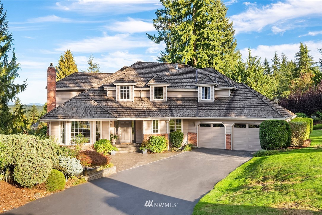 21127 47th Drive Southeast Bothell, WA 98021 - Photo 38 of 38 a front view of a house with garden
