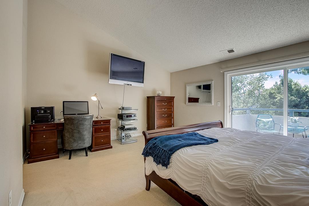 1303 Victoria Terrace Sunnyvale, CA 94087 - Photo 11 of 27 a bedroom with a bed and furniture