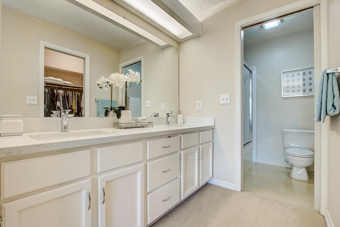 1303 Victoria Terrace Sunnyvale, CA 94087 - Photo 12 of 27 a spacious bathroom with a double vanity sink a mirror and a toilet