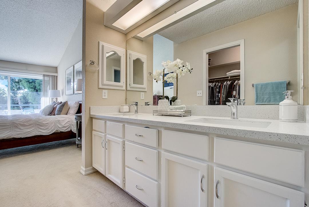1303 Victoria Terrace Sunnyvale, CA 94087 - Photo 13 of 27 a en suite bathroom with double sink and a large mirror