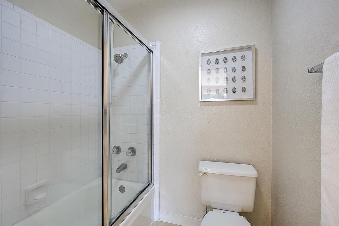 1303 Victoria Terrace Sunnyvale, CA 94087 - Photo 14 of 27 a bathroom with a toilet and a shower