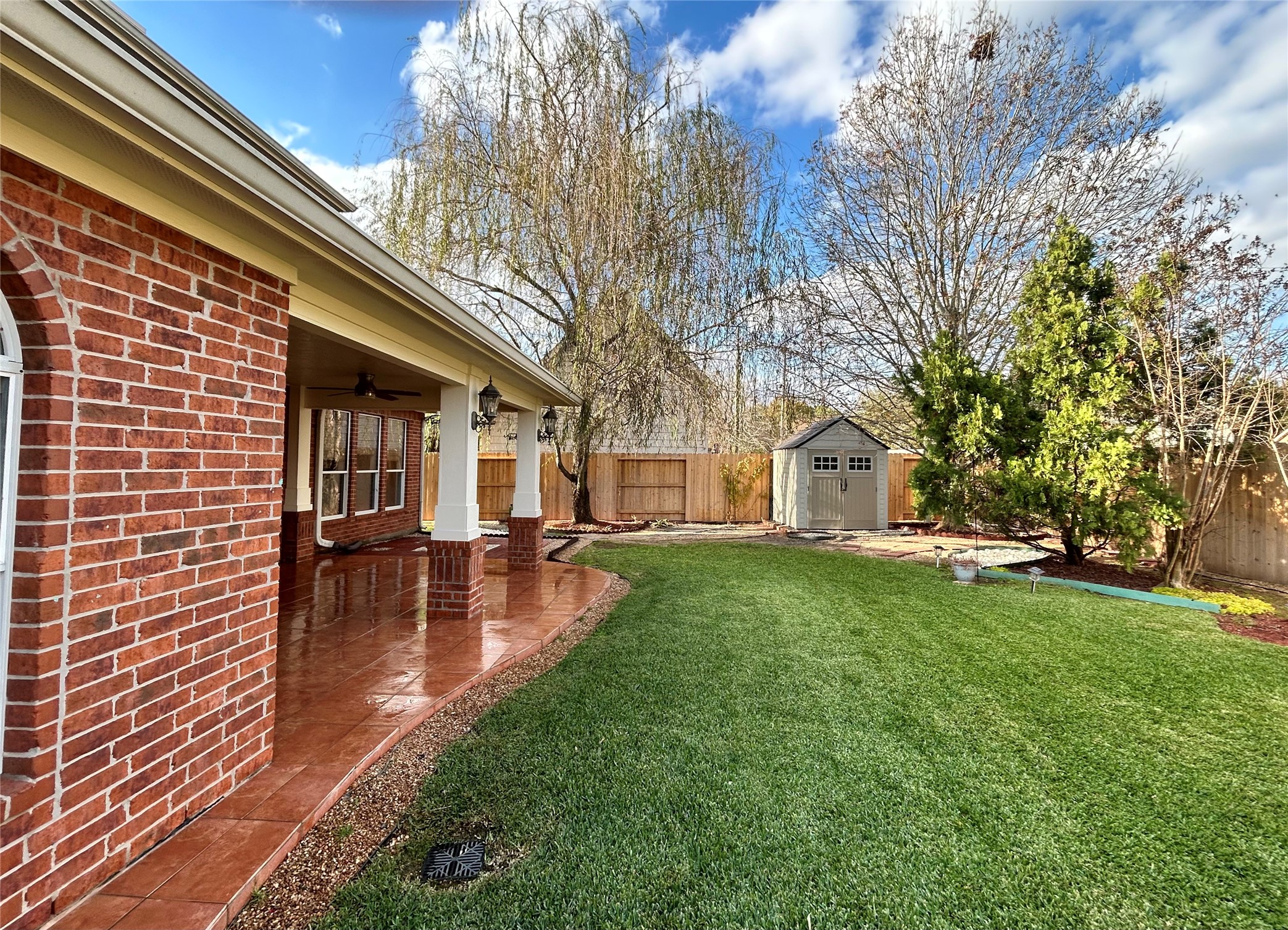 2110 Great Prairie Lane Katy, TX 77494 - Photo 2 of 4 a view of a patio with a table chairs and a fire pit