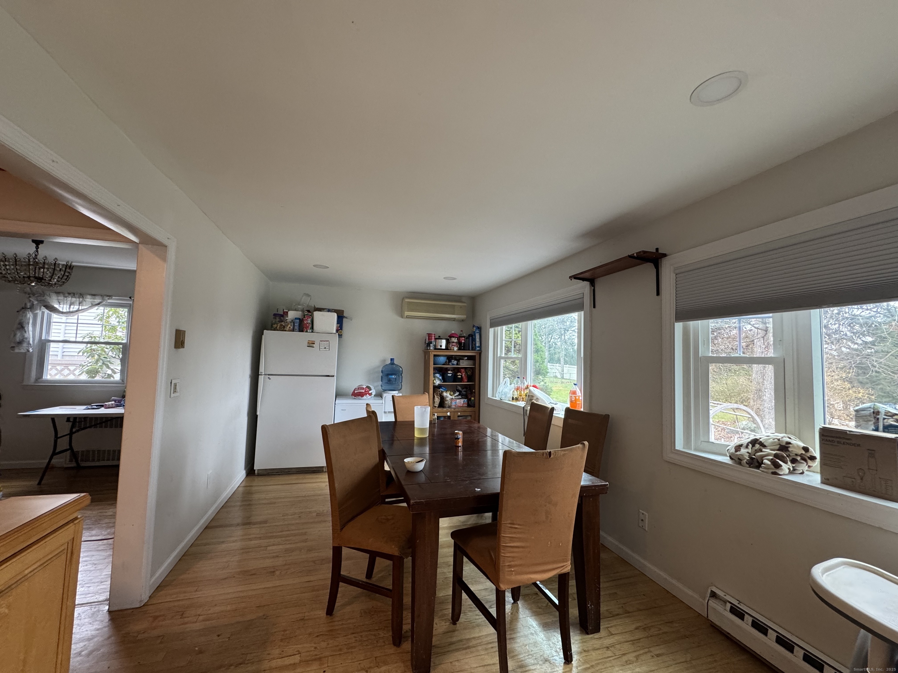 20 Oak Ridge Gate Danbury, CT 06810 - Photo 6 of 15 a view of a dining room with furniture and window