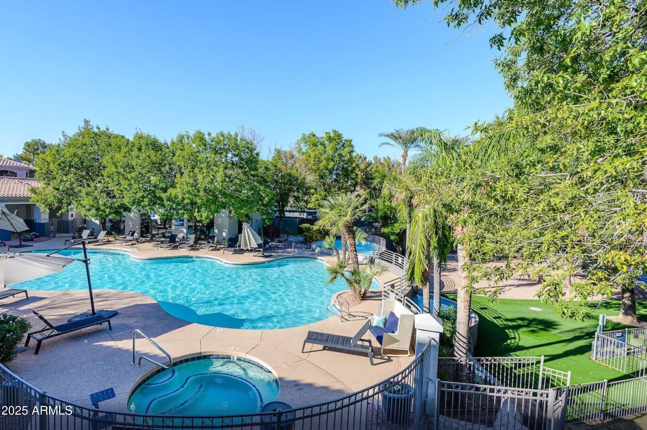 600 West Grove Parkway Tempe, AZ 85283 - Photo 1 of 23 a backyard of a house with yard and outdoor seating