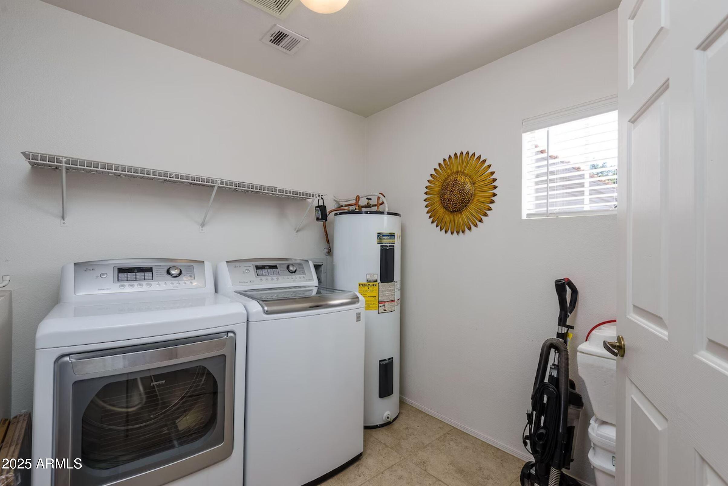 600 West Grove Parkway Tempe, AZ 85283 - Photo 10 of 23 a utility room with dryer and washer