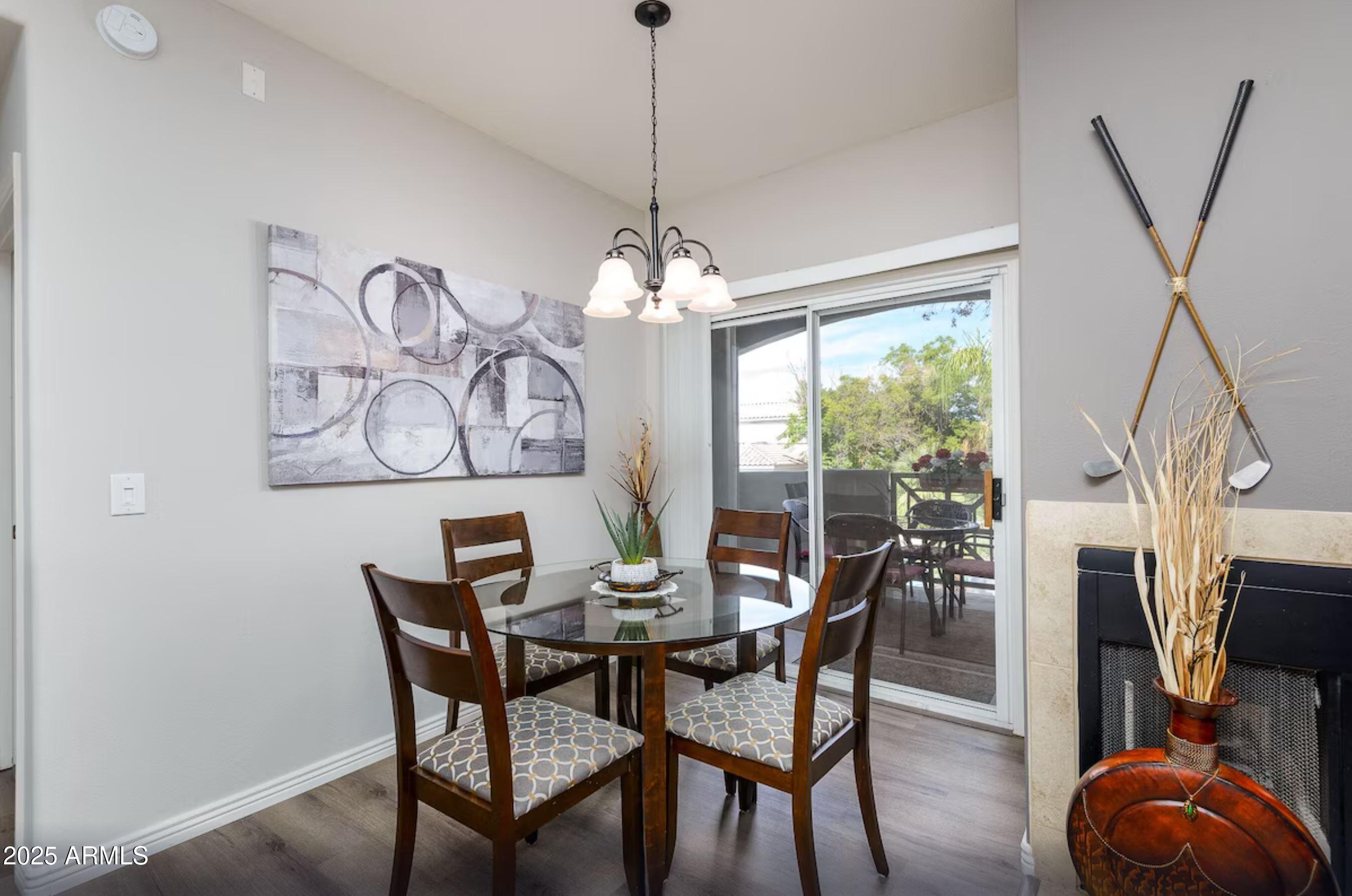 600 West Grove Parkway Tempe, AZ 85283 - Photo 8 of 23 a view of a dining room with furniture window and wooden floor