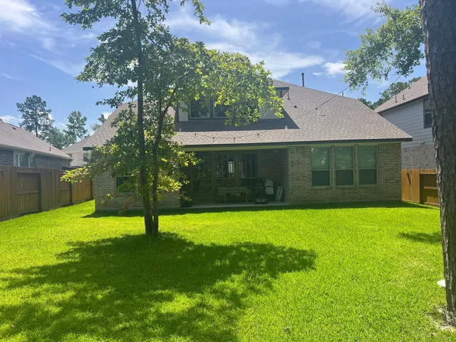 a view of a backyard with a garden