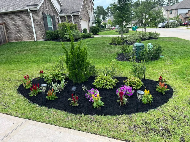 a view of a house with a big yard and garden