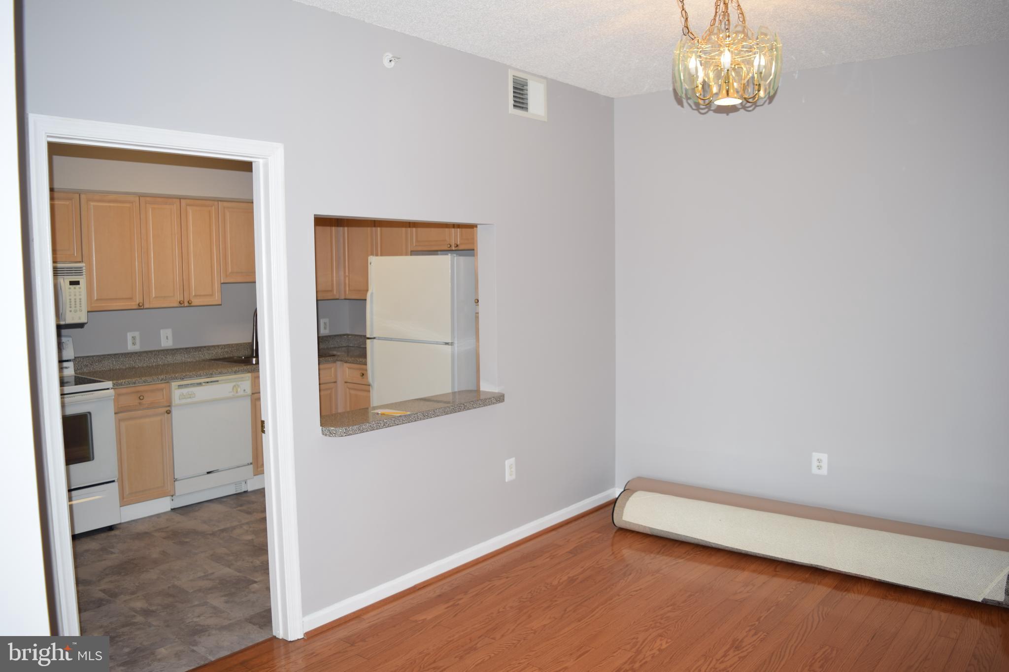 19375 Cypress Ridge Terrace, Unit 502 Leesburg, VA 20176 - Photo 12 of 43 Sizable dining room