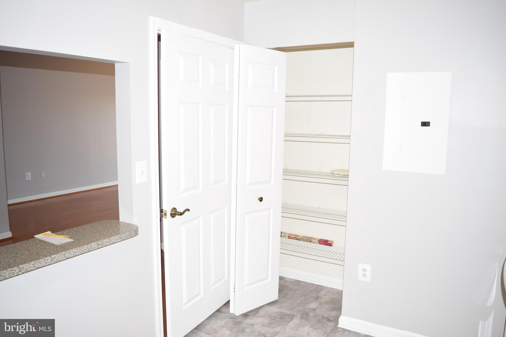 19375 Cypress Ridge Terrace, Unit 502 Leesburg, VA 20176 - Photo 16 of 43 Ample pantry