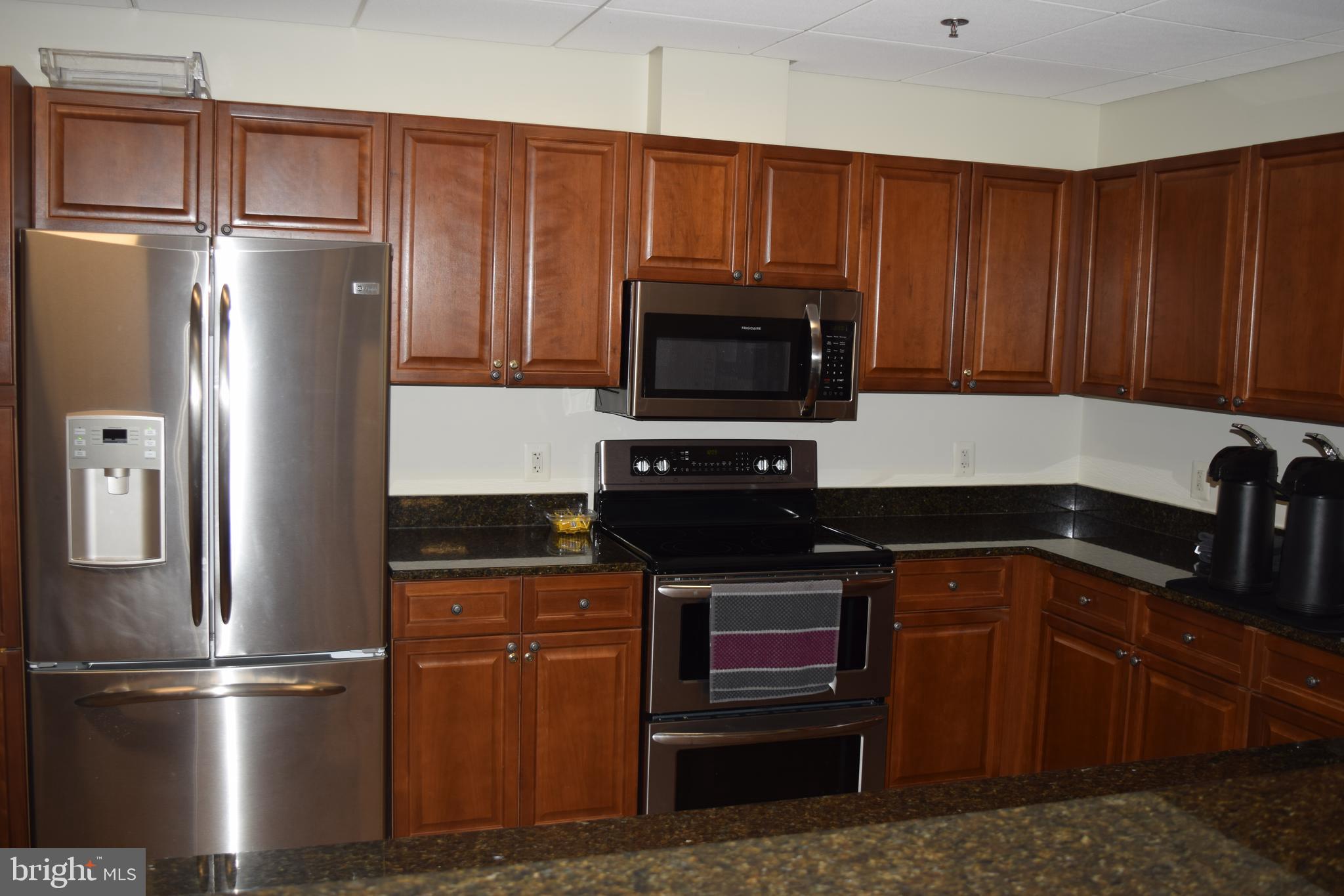 19375 Cypress Ridge Terrace, Unit 502 Leesburg, VA 20176 - Photo 32 of 43 Common area kitchen