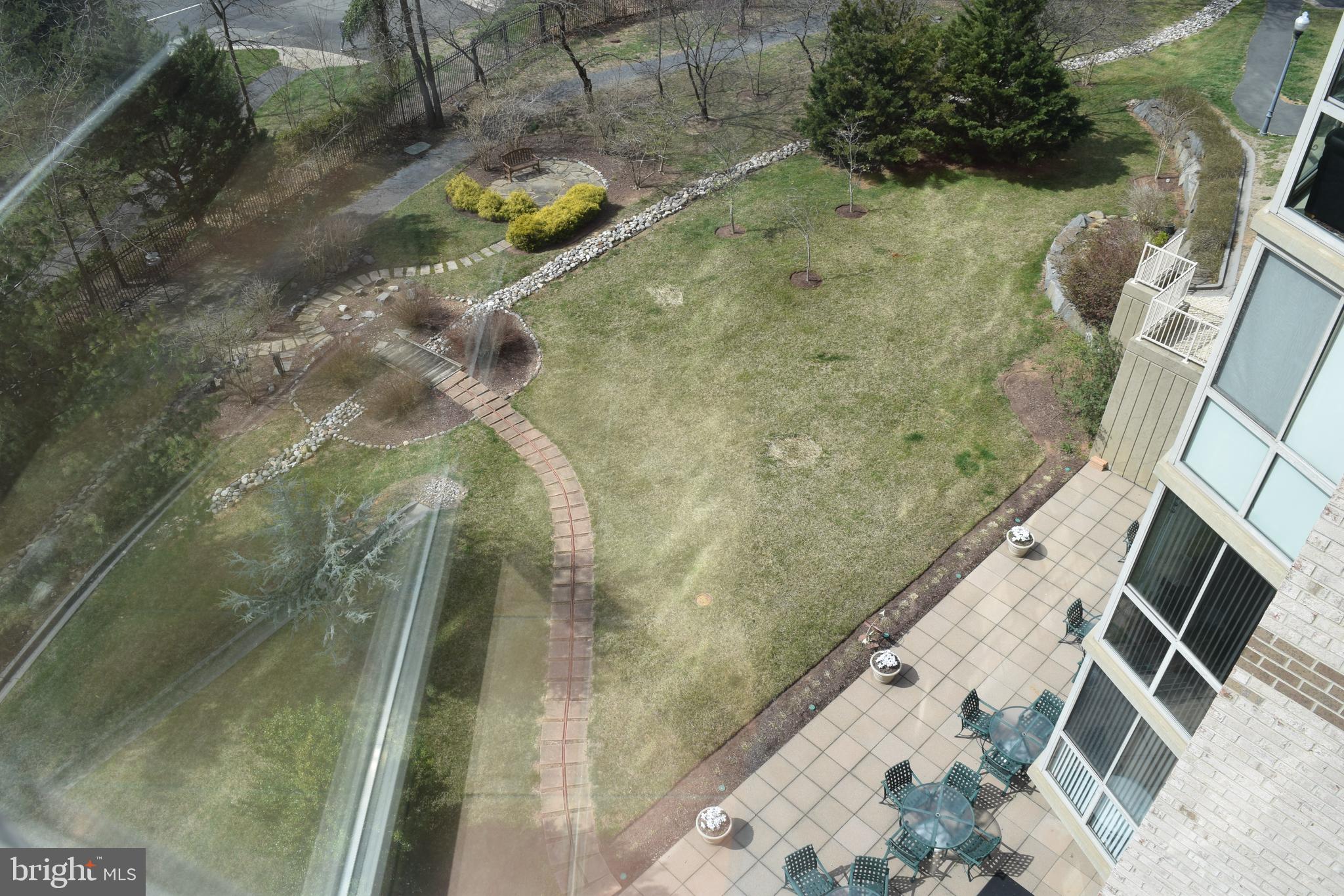 19375 Cypress Ridge Terrace, Unit 502 Leesburg, VA 20176 - Photo 34 of 43 View of patio from the unit's balcony