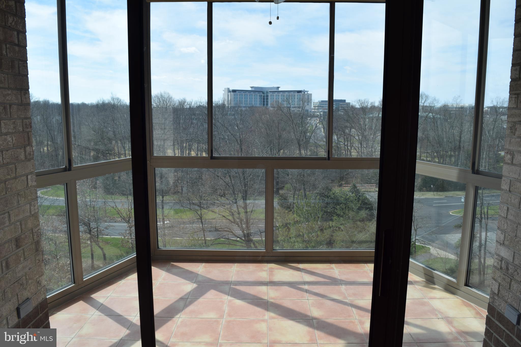 19375 Cypress Ridge Terrace, Unit 502 Leesburg, VA 20176 - Photo 7 of 43 Expansive views from enclosed balcony