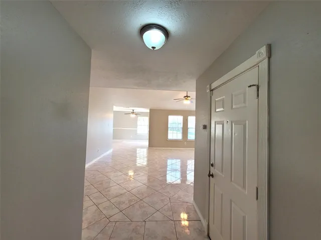 a view of entryway with livingroom