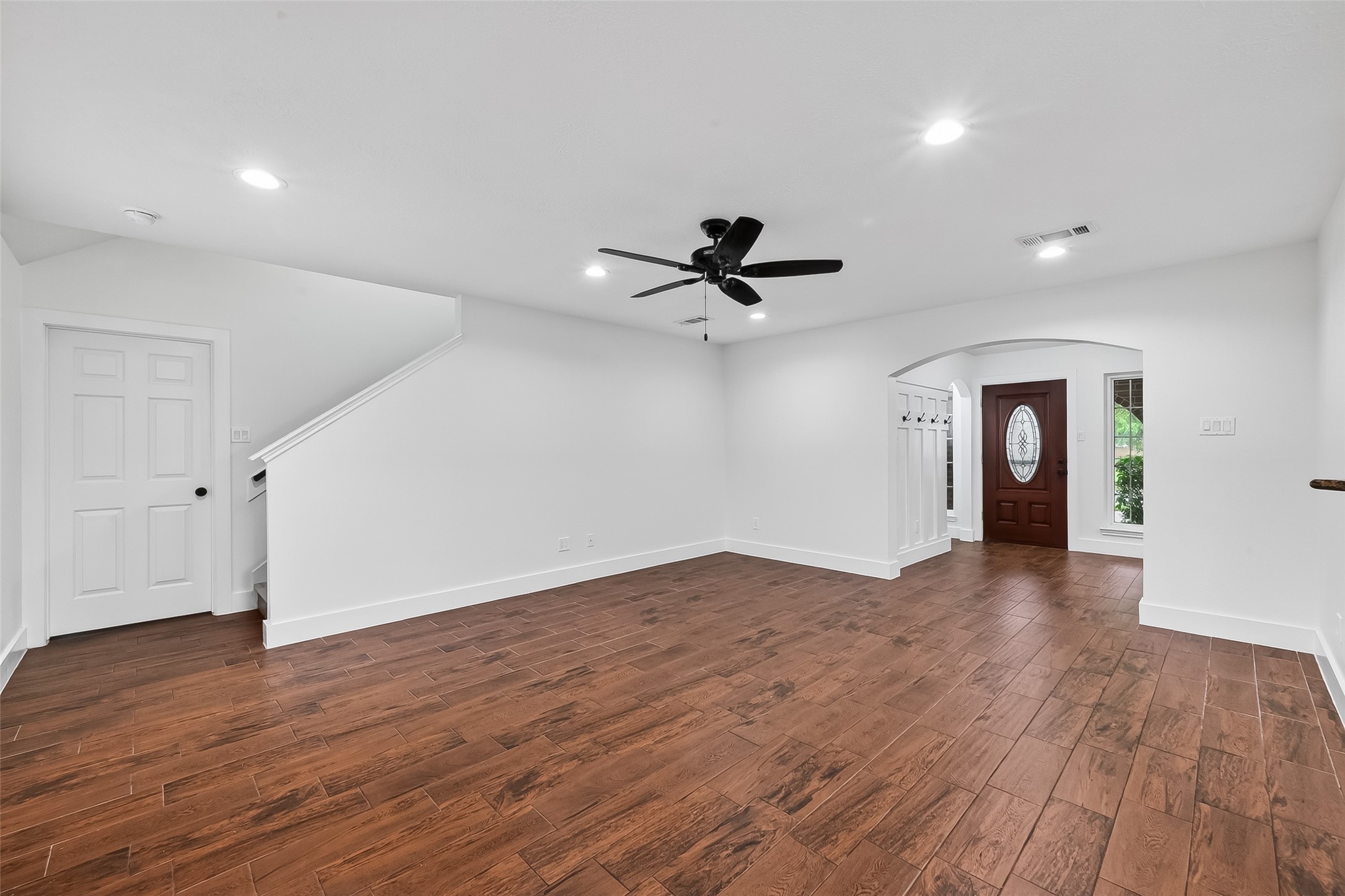 2018 Village Ct Lane Rosenberg, TX 77471 - Photo 21 of 50 a view of empty room with wooden floor and ceiling fan