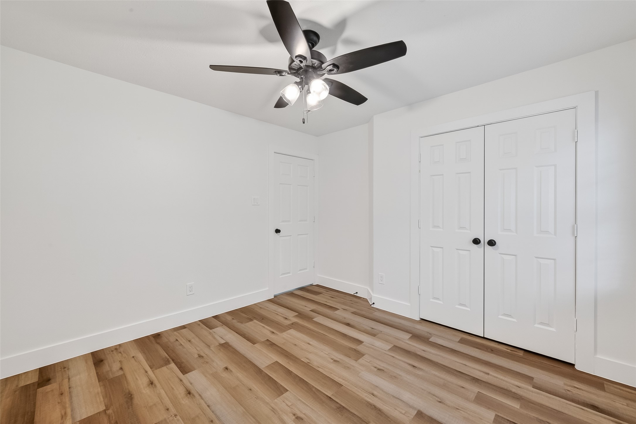 2018 Village Ct Lane Rosenberg, TX 77471 - Photo 33 of 50 wooden floor in an empty room