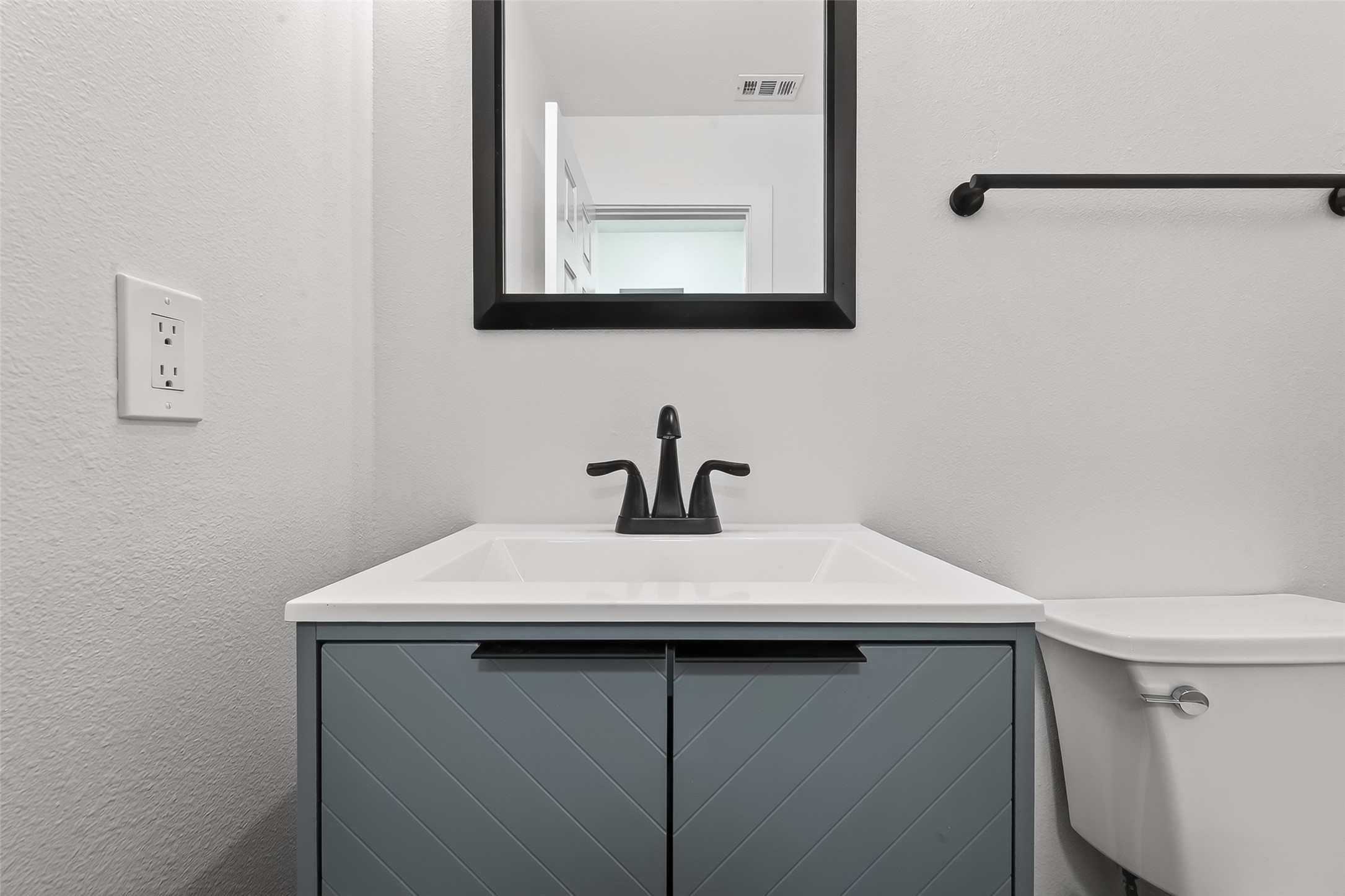 2018 Village Ct Lane Rosenberg, TX 77471 - Photo 39 of 50 a bathroom with a sink and a mirror