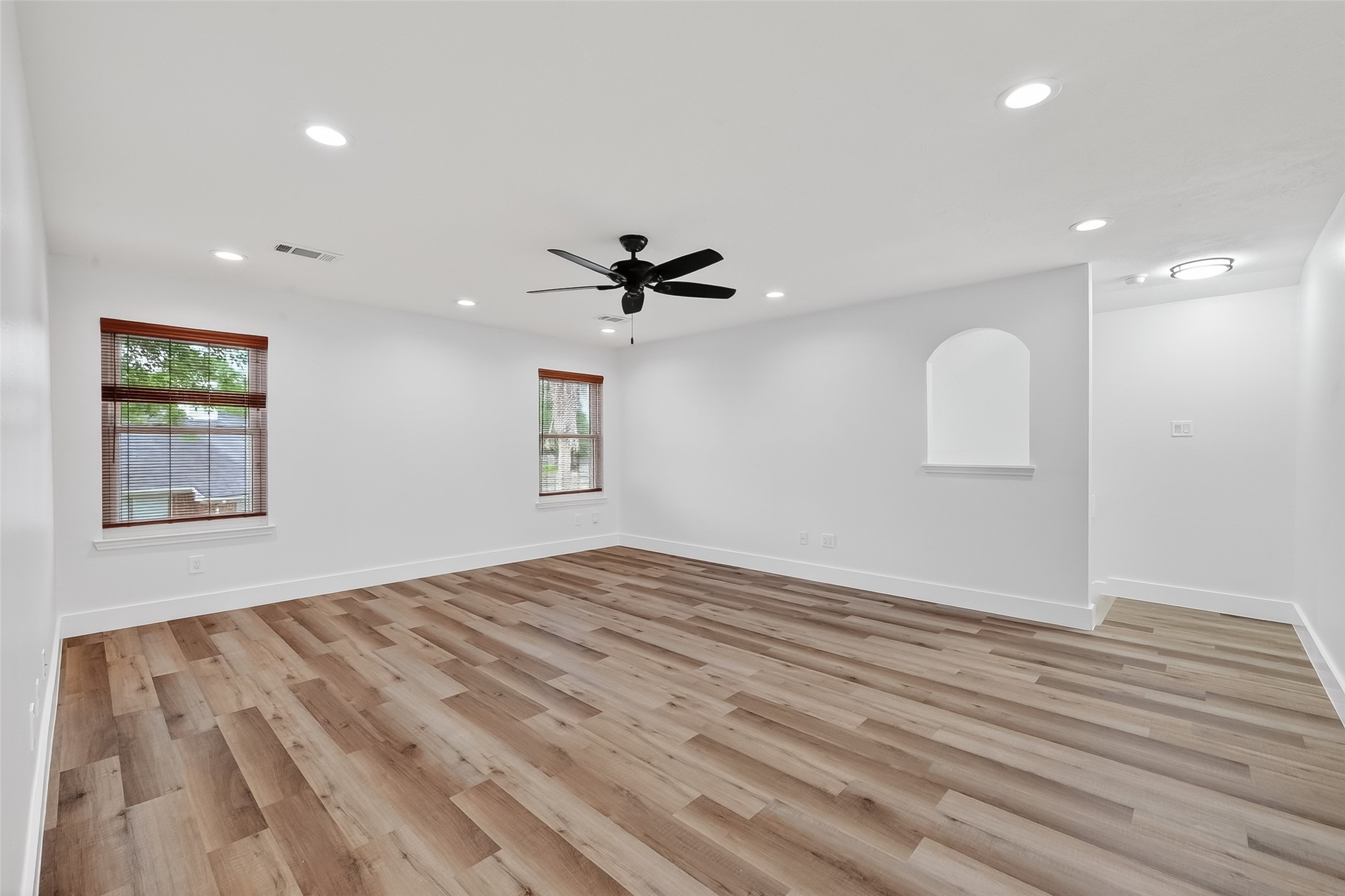 2018 Village Ct Lane Rosenberg, TX 77471 - Photo 41 of 50 a view of livingroom with hardwood floor and a ceiling fan