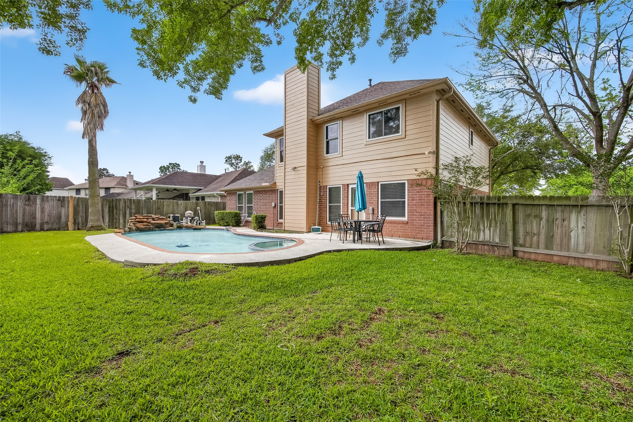 2018 Village Ct Lane Rosenberg, TX 77471 - Photo 48 of 50 a view of a house with a yard and a tree