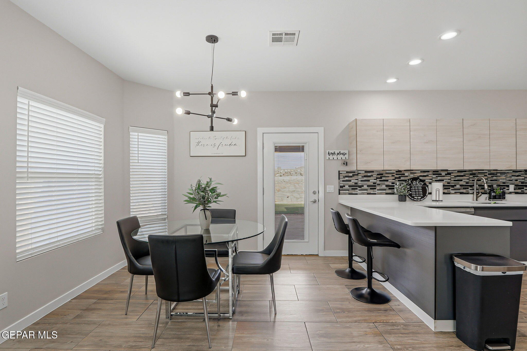 123 Via Rojas Drive Horizon City, TX 79928 - Photo 13 of 47 a view of a dining room with furniture