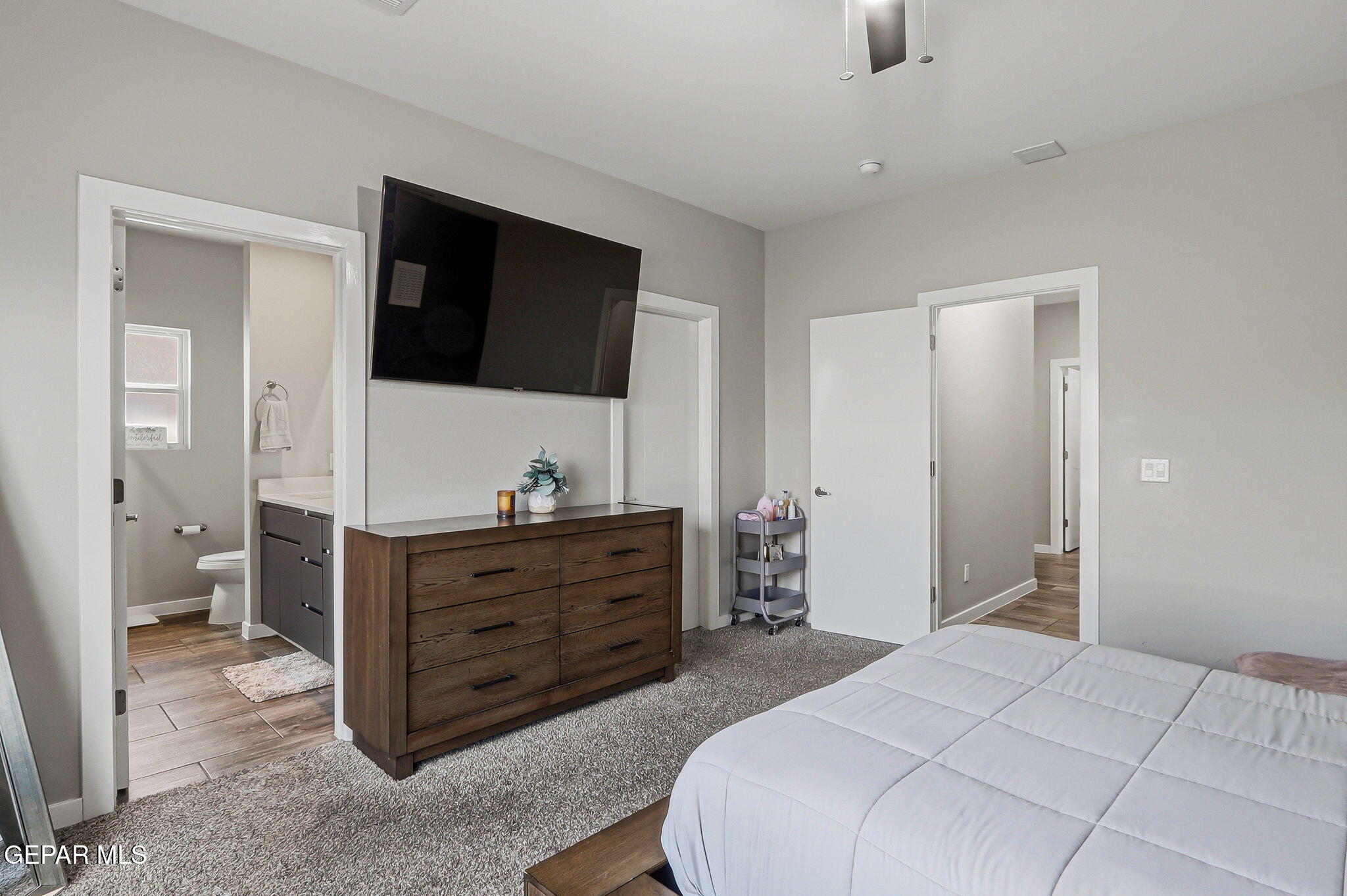 123 Via Rojas Drive Horizon City, TX 79928 - Photo 23 of 47 a bedroom with a bed and a television