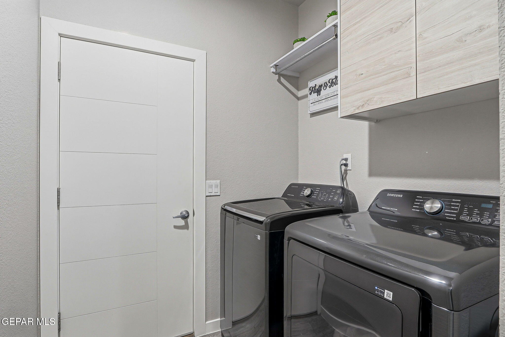 123 Via Rojas Drive Horizon City, TX 79928 - Photo 34 of 47 a utility room with dryer and washer