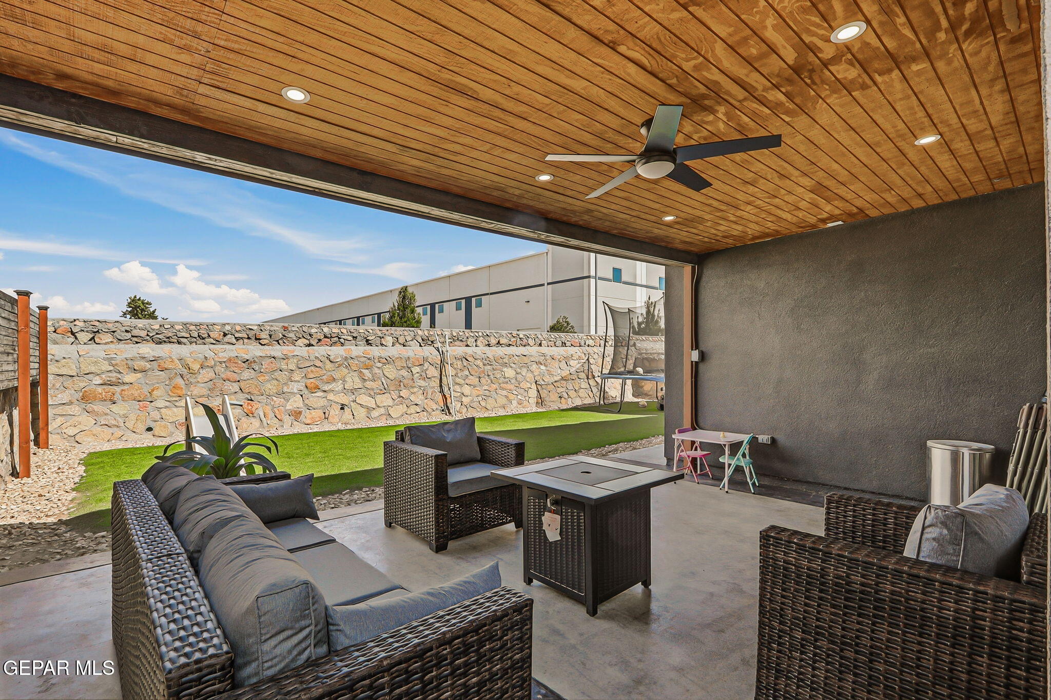 123 Via Rojas Drive Horizon City, TX 79928 - Photo 35 of 47 a outdoor living space with furniture