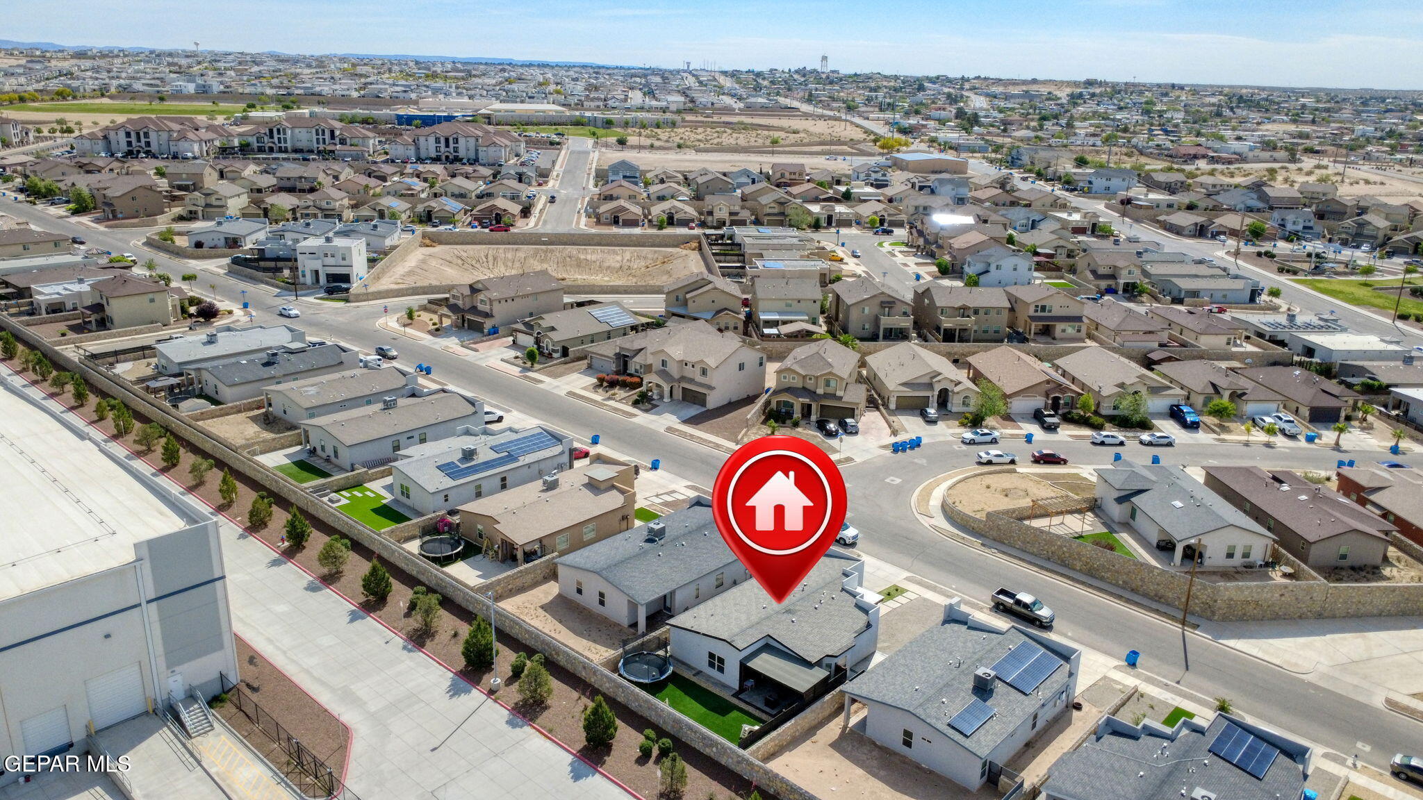 123 Via Rojas Drive Horizon City, TX 79928 - Photo 41 of 47 an aerial view of a red and white car parked on the side of street