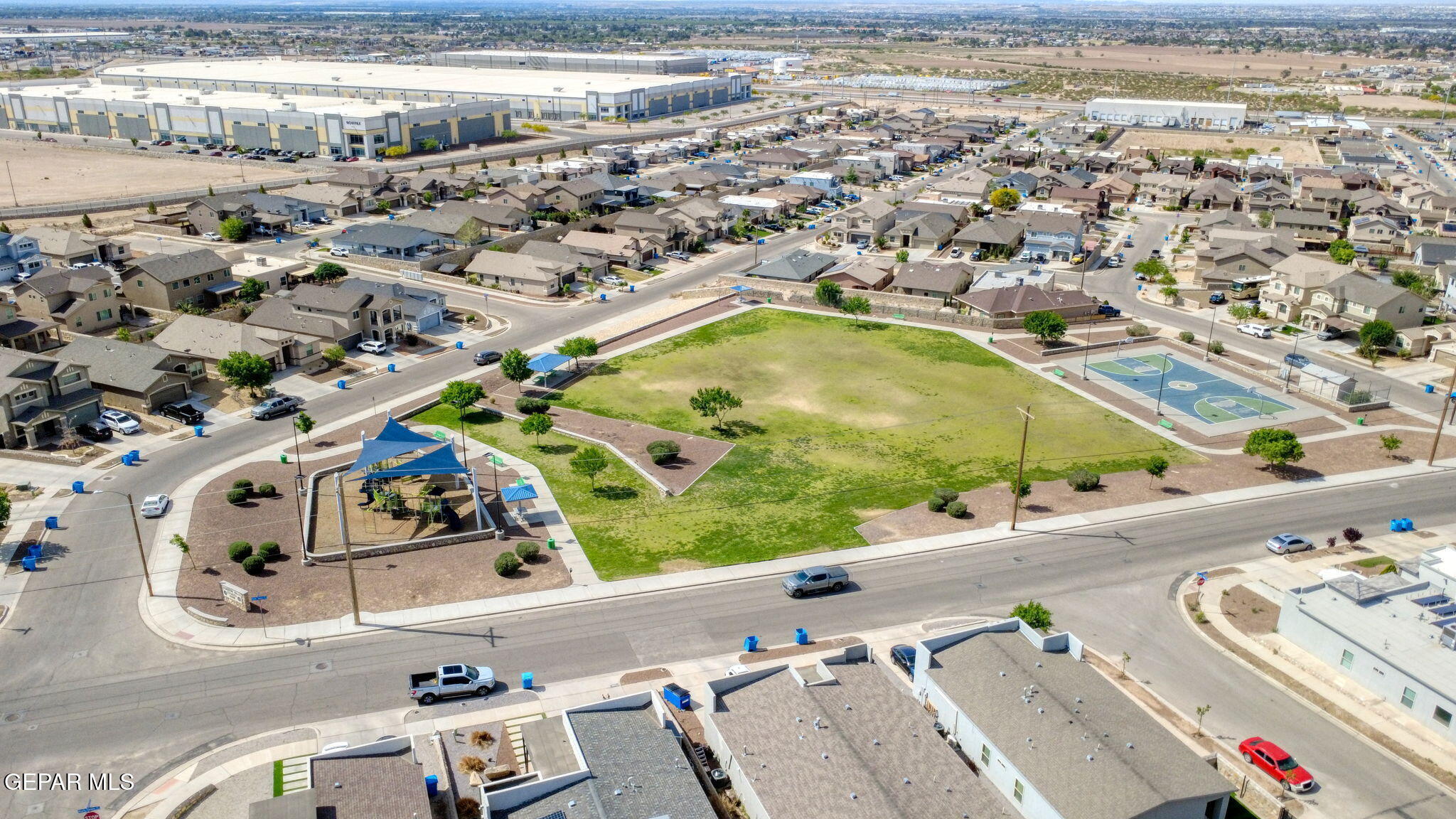 123 Via Rojas Drive Horizon City, TX 79928 - Photo 44 of 47 an aerial view of a house with a swimming pool