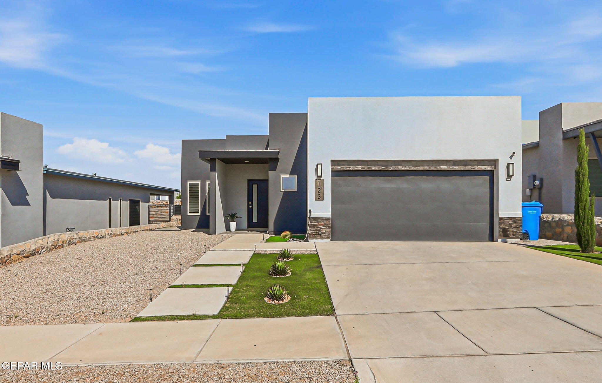 123 Via Rojas Drive Horizon City, TX 79928 - Photo 5 of 47 a front view of a house with yard