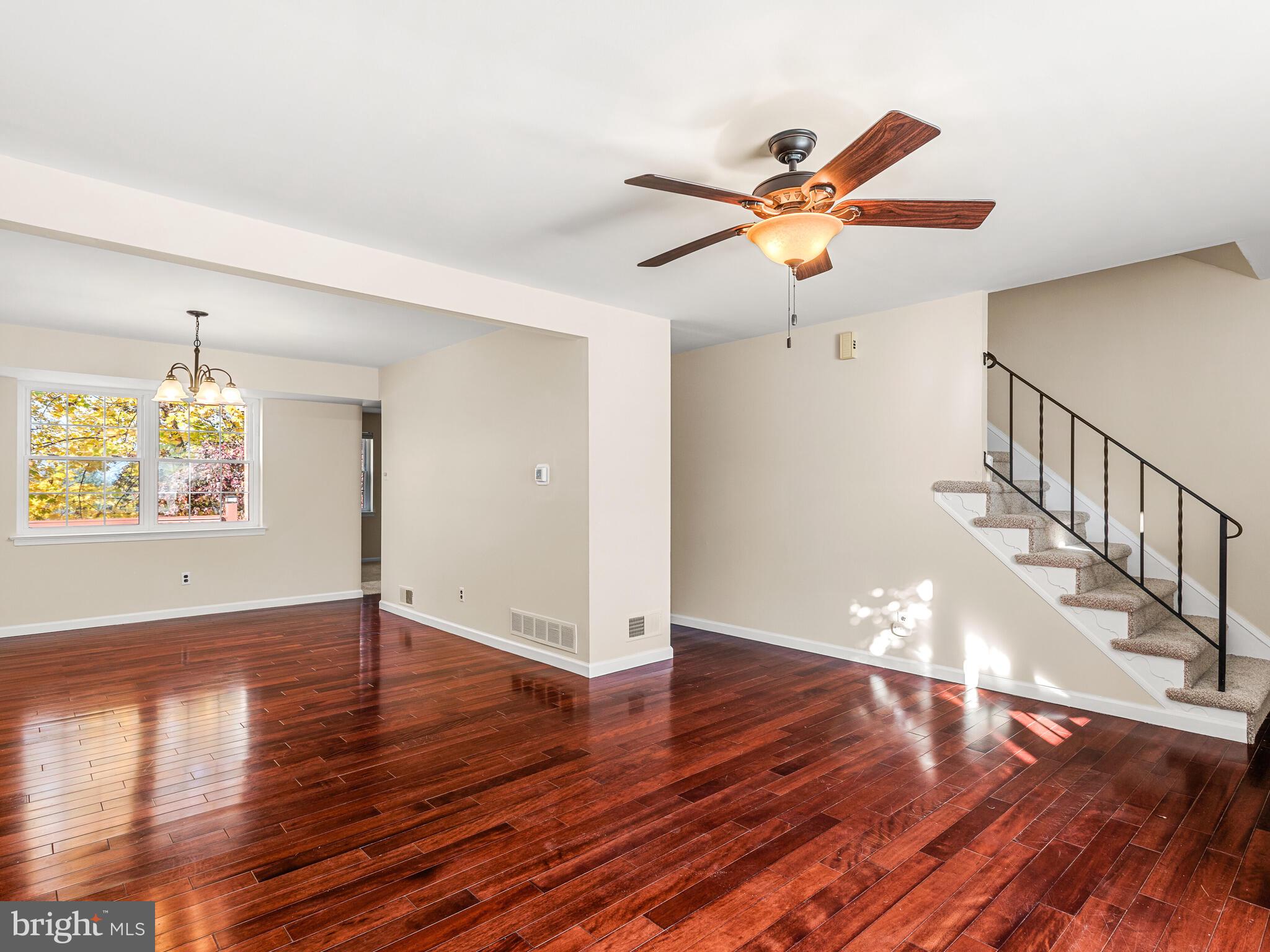 222 Llandovery Drive Exton, PA 19341 - Photo 4 of 32 Living Room and Dining Room with Hardwood Floors