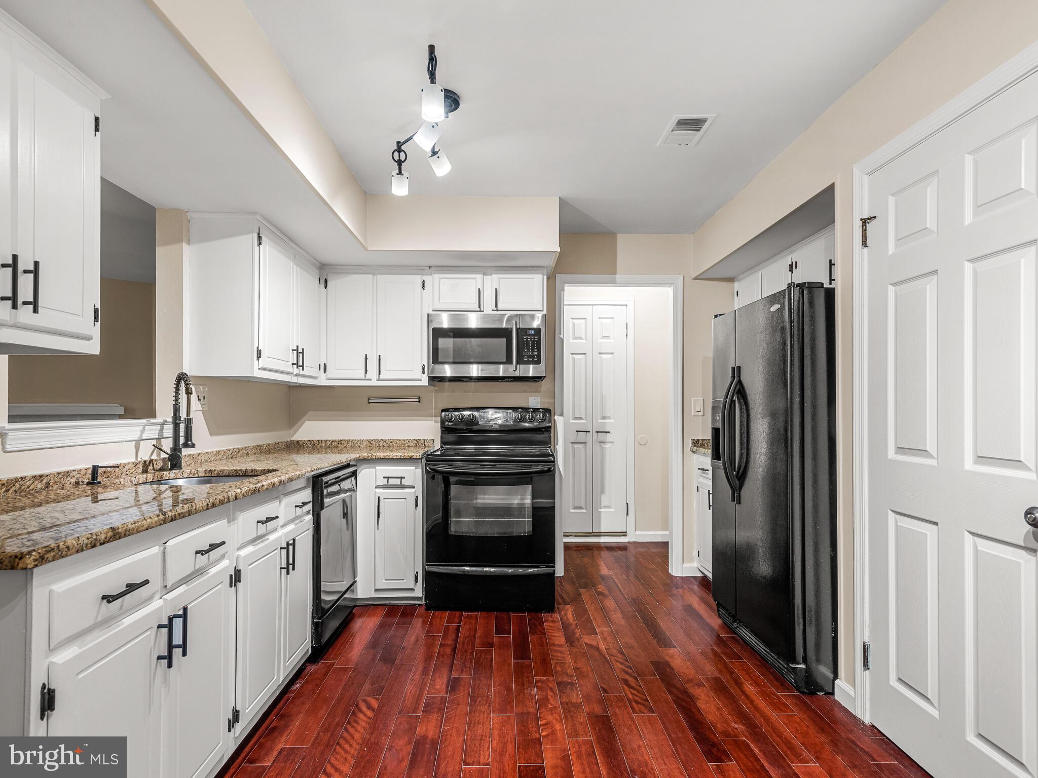 222 Llandovery Drive Exton, PA 19341 - Photo 9 of 32 Kitchen with pantry & garage access