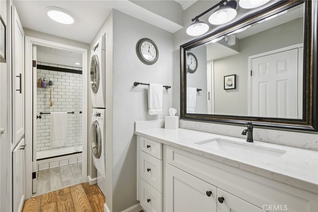 1750 East Ocean Boulevard, Unit 102 Long Beach, CA 90802 - Photo 9 of 22 a bathroom with a sink and a mirror