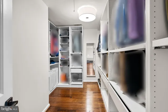 a view of entryway with wooden floor