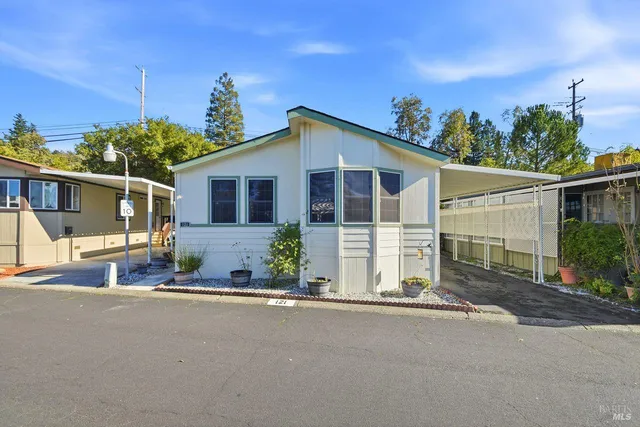 front view of a house with a street
