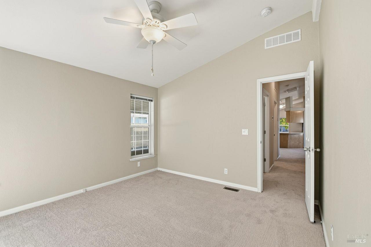 121 Coronado Circle Santa Rosa, CA 95409 - Photo 13 of 32 an empty room with fan and windows