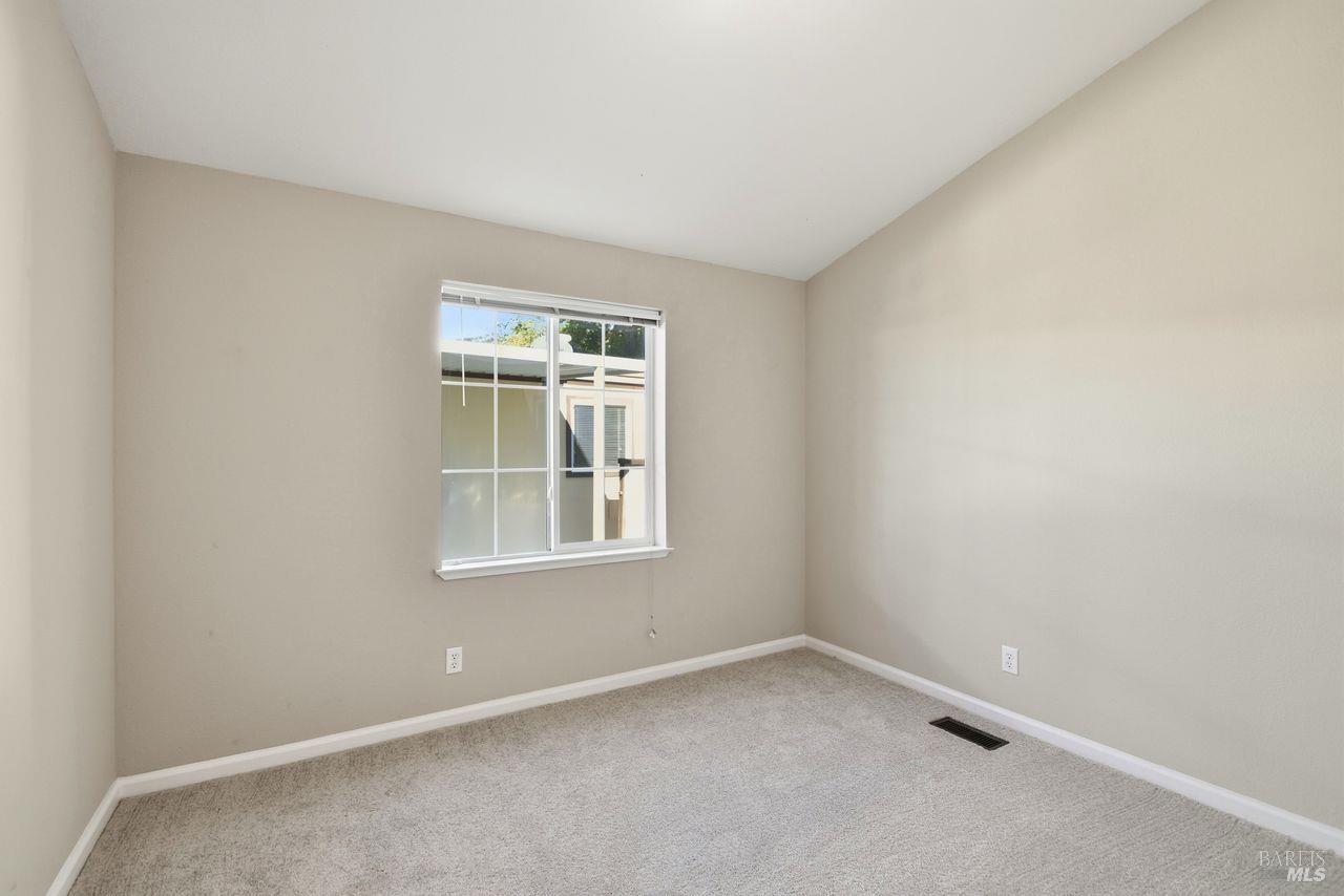121 Coronado Circle Santa Rosa, CA 95409 - Photo 20 of 32 an empty room with a window