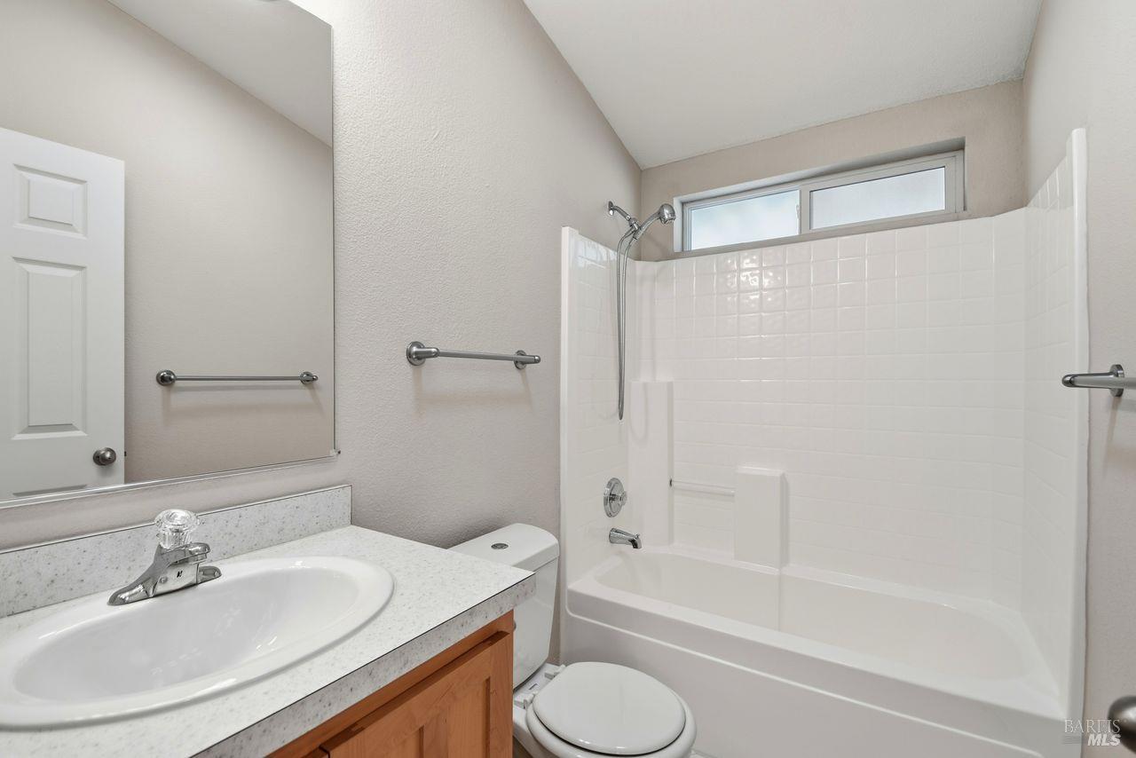 121 Coronado Circle Santa Rosa, CA 95409 - Photo 21 of 32 a bathroom with a sink toilet and shower