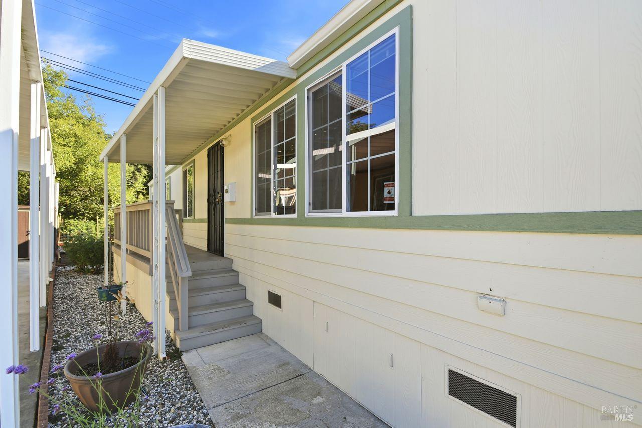121 Coronado Circle Santa Rosa, CA 95409 - Photo 4 of 32 a view of a brick house with a large window