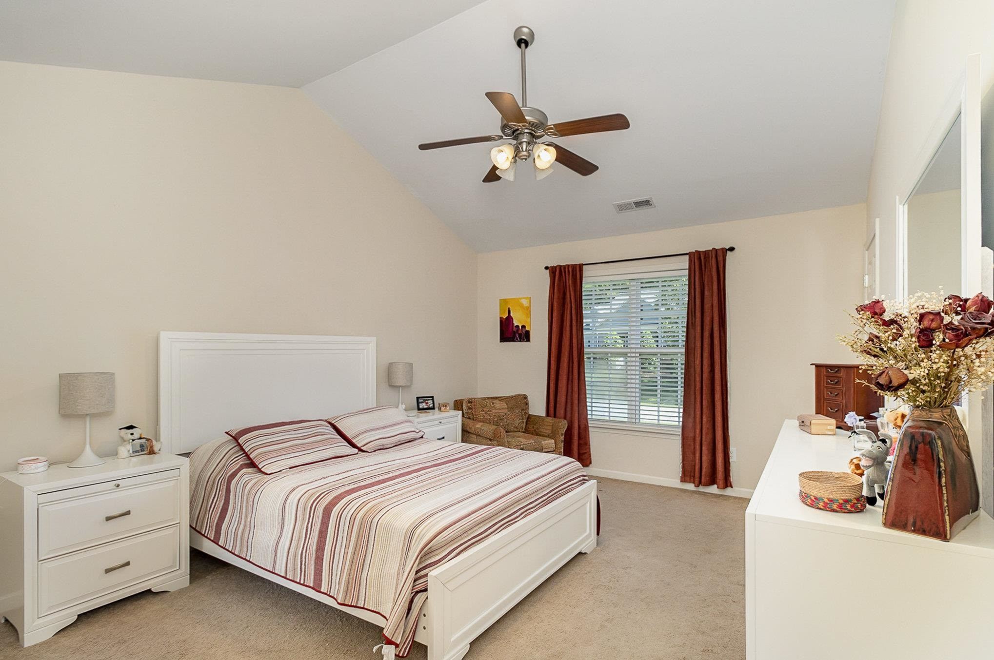 226 Keller Drive Clayton, NC 27520 - Photo 16 of 30 a bedroom with a bed and a window