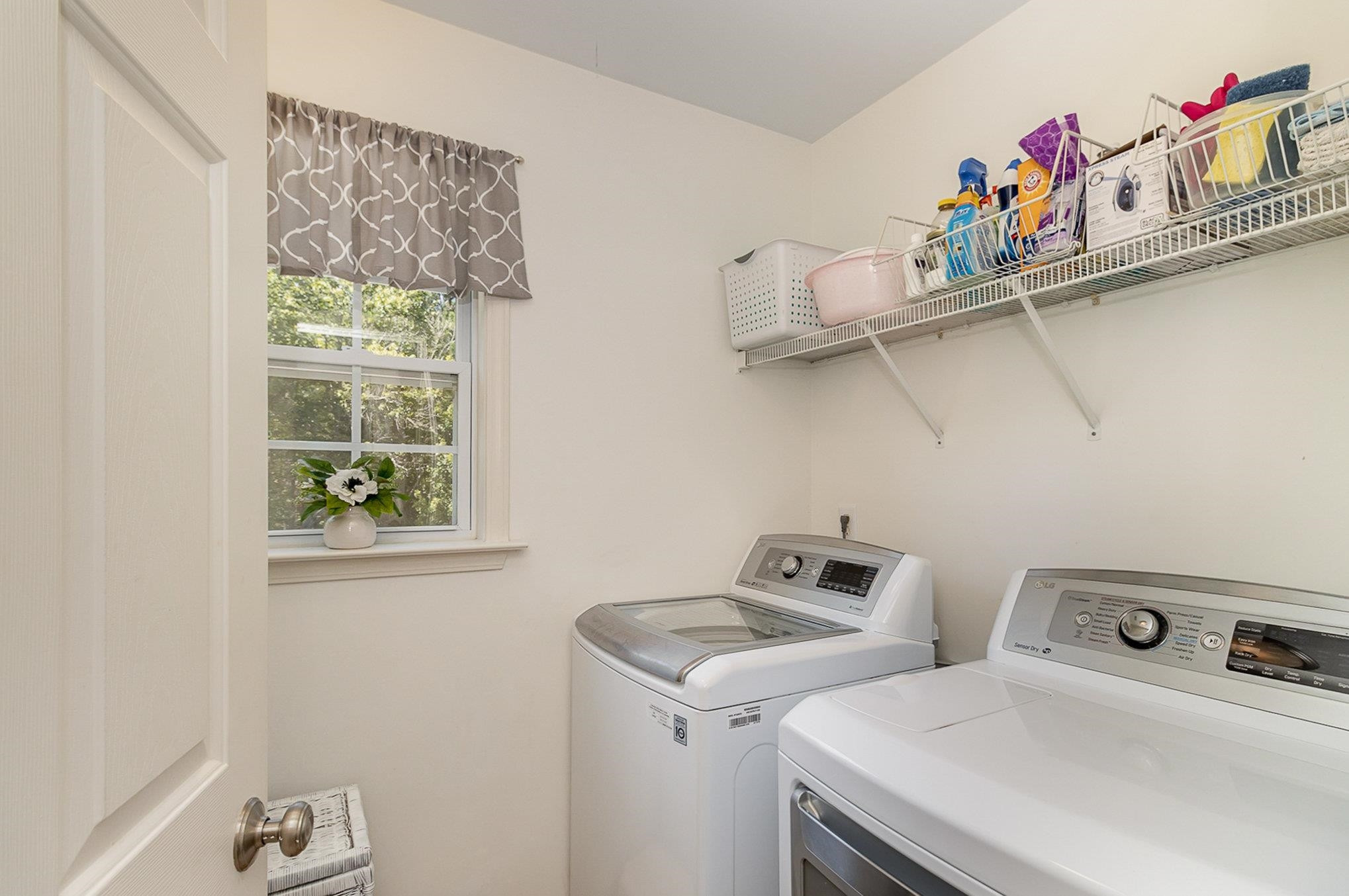 226 Keller Drive Clayton, NC 27520 - Photo 24 of 30 a utility room with dryer and washer