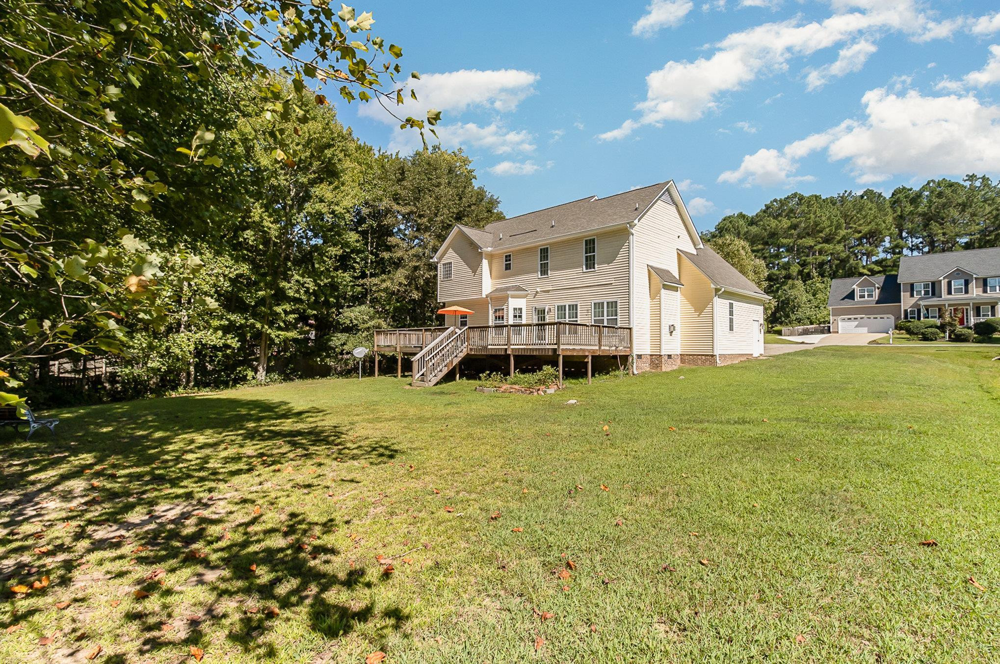 226 Keller Drive Clayton, NC 27520 - Photo 29 of 30 a view of a house with a big yard