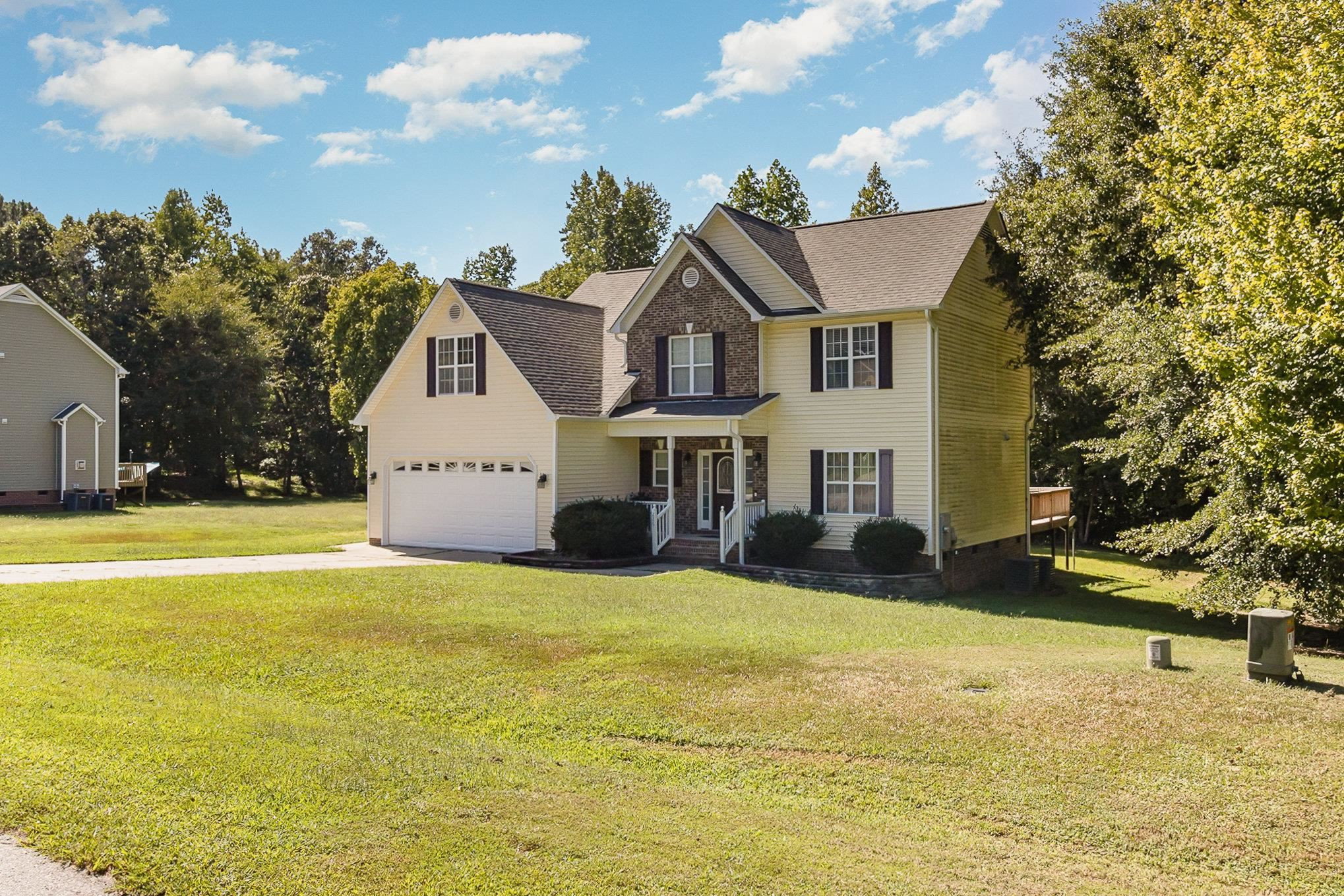 226 Keller Drive Clayton, NC 27520 - Photo 3 of 30 a view of a house with pool and snow on the road