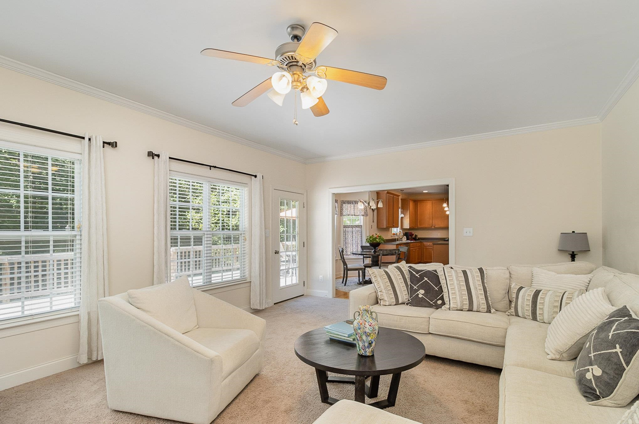 226 Keller Drive Clayton, NC 27520 - Photo 6 of 30 a living room with furniture and a large window